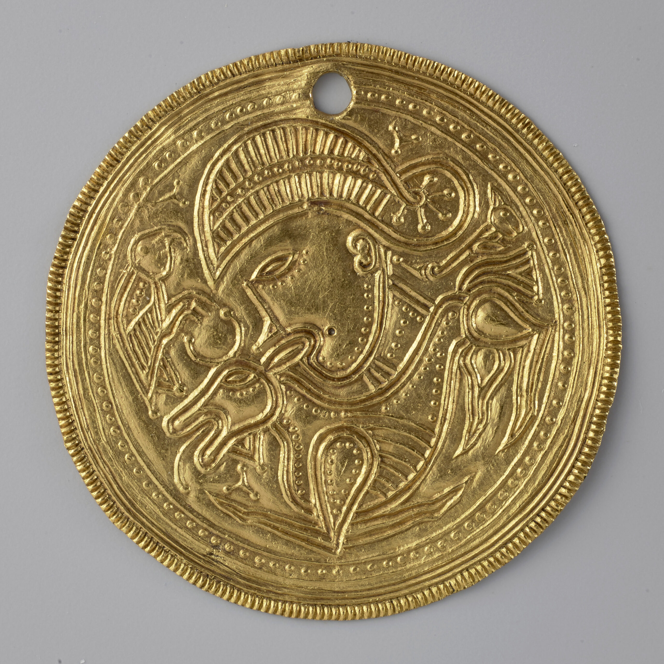 Bracteate. Tveitene, Vestfold og Telemark, Norway. Kulturhistorisk Museum, Oslo, C2490. Photo: Kirsten Helgeland (CC BY).