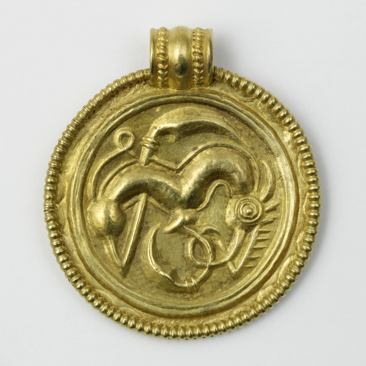 Bracteate. Voll, Rogaland, Norway. Arkeologisk Museum, Stavanger, S938. Photo: Terje Tveit (CC BY-NC-ND 01).