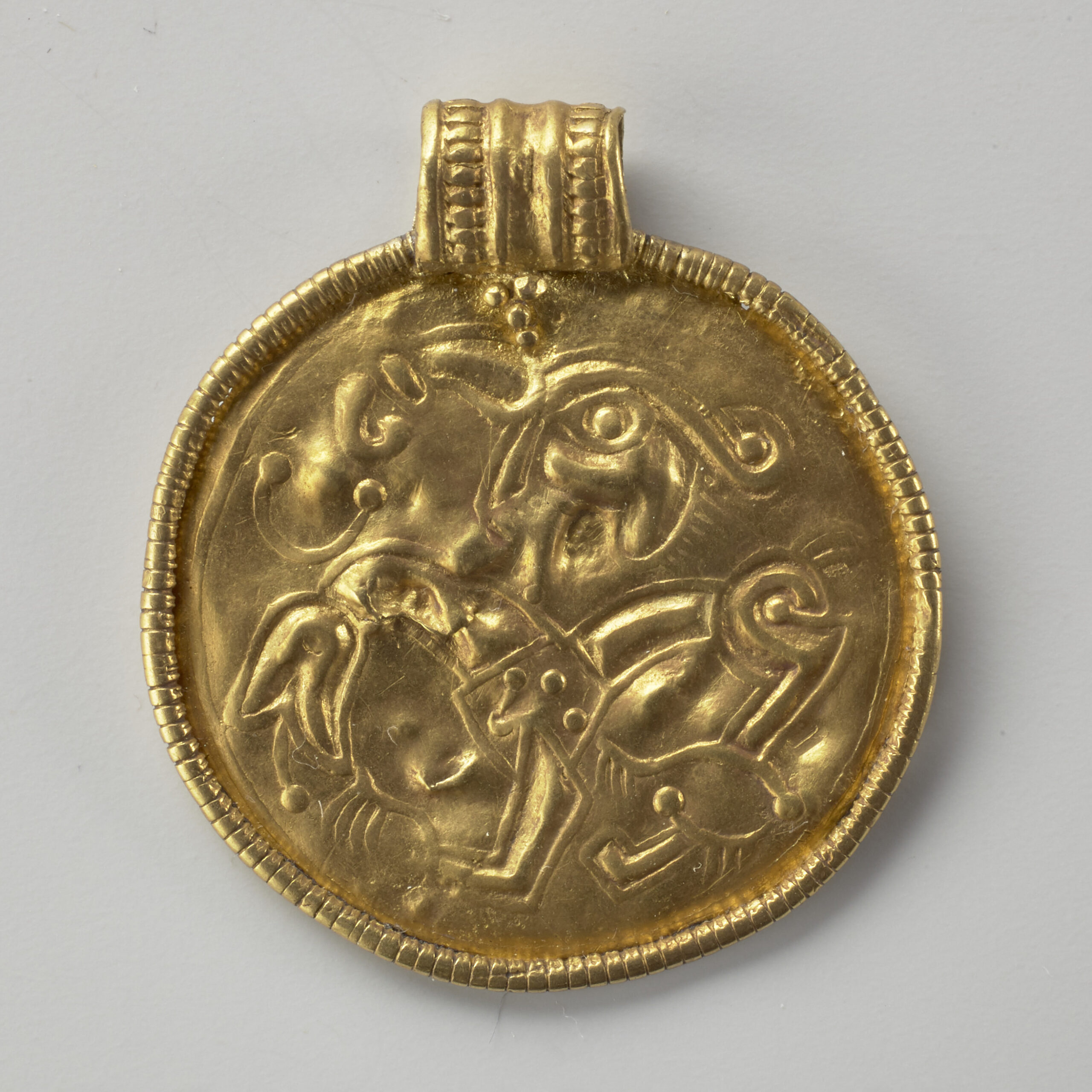 Bracteate. Sletner, Viken, Norway. Kulturhistorisk Museum, Oslo, C2486. Photo: Kirsten Helgeland (CC BY-SA).