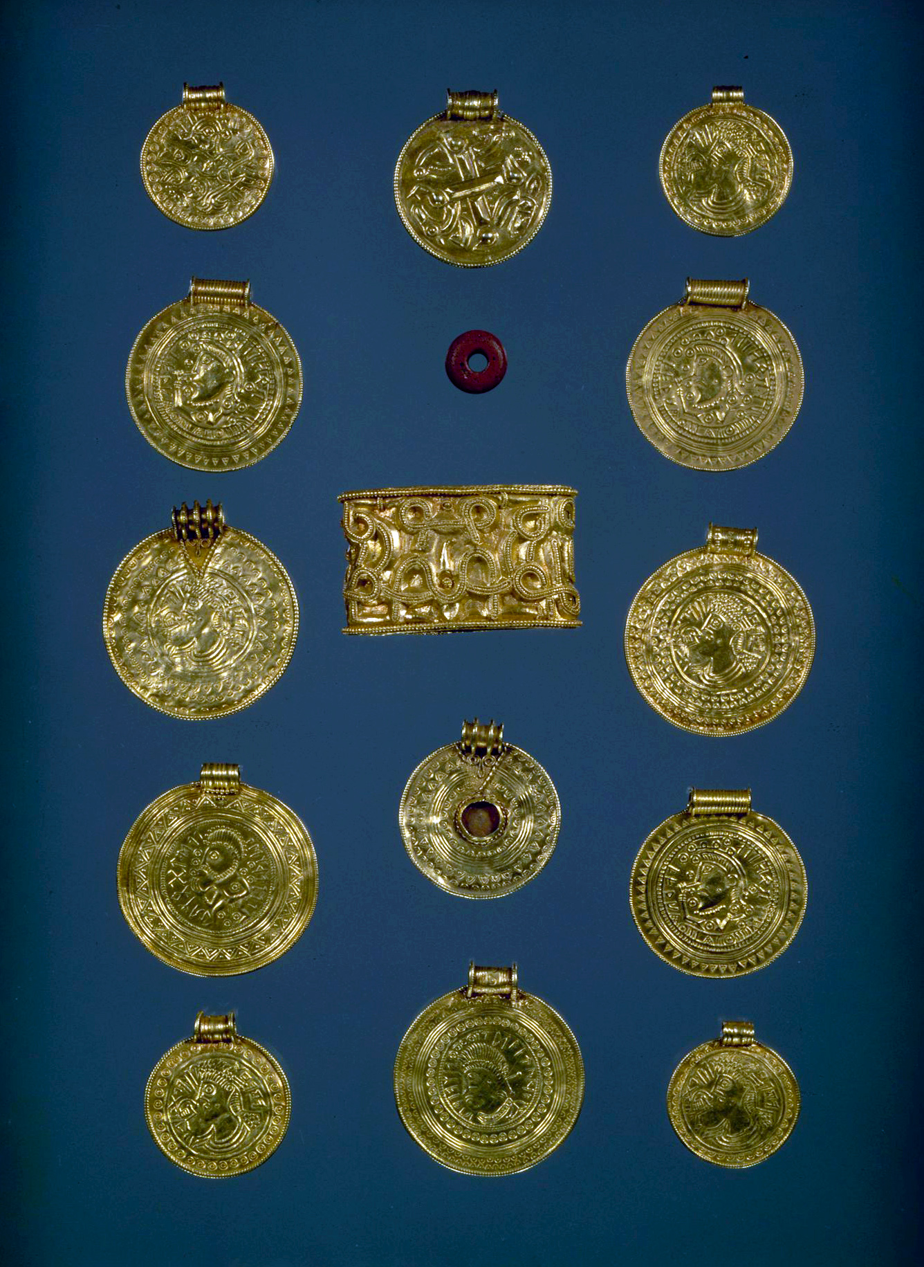 Bracteates. Darum, Jylland, Denmark. Nationalmuseet, København, C5228-32; C5227; C5233. Photo: Jesper Weng (CC BY-NC-ND).